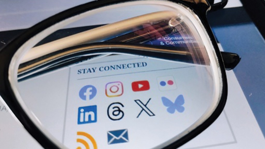 glasses over social icons like facebook, instagram, x and youtube